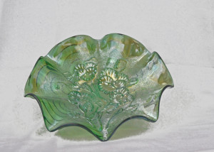 Green, fluted plate with Imperial "pansies" design.