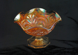 Orange sugar, with Imperial "scrolls" design inside and a pattern of arches & diamonds outside.